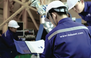 DSI technicians performing on-site machine maintenance service