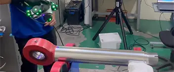 Handheld 3D scanner measuring a hydraulic cylinder rod
