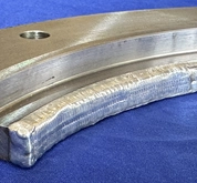 Close-up of a Pulse Laser Welded curved bronze component