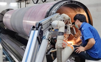 DSI technician performing Pulse Laser Mobile Welding on piping equipment
