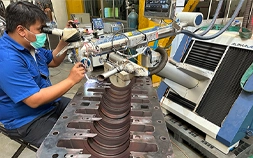 DSI technician performing Pulse Laser Welding on a crankshaft